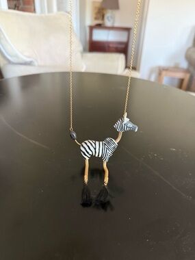 Nach Zebra Pendant Necklace in Black and White with Gold Chain
